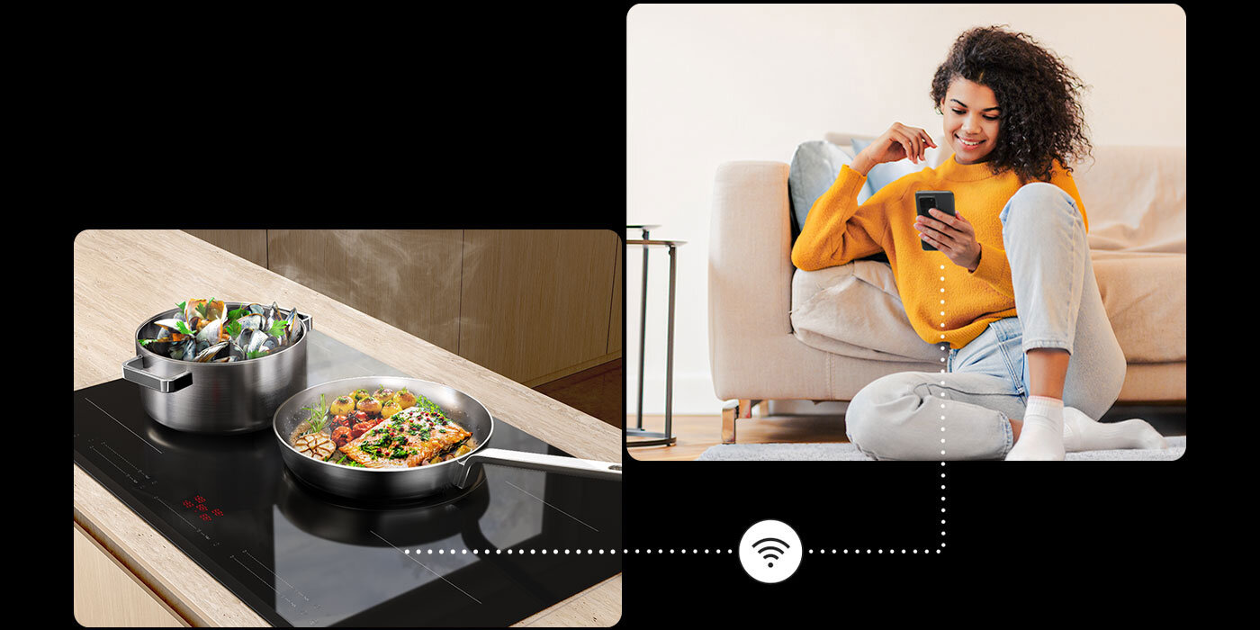 Osoba trzymająca telefon, który zdalnie monitoruje płytę indukcyjną Samsung NZ85C5047GK 