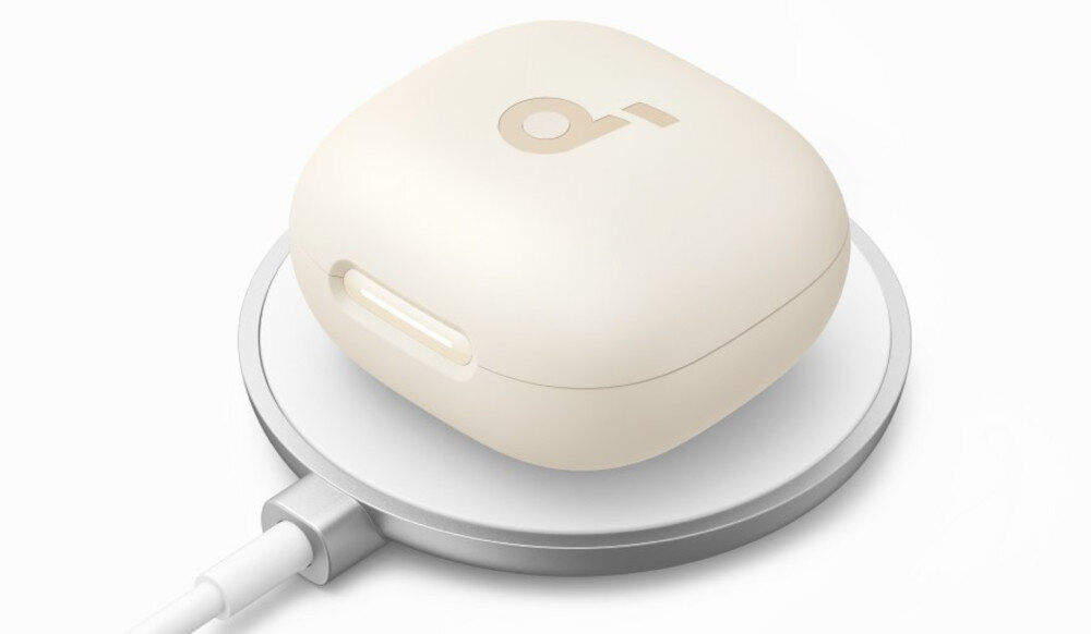 Słuchawki dokanałowe SOUNDCORE P40i ANC ładowanie bezprzewodowe indukcyjne etui, etui ładukące położone na ładowarce indukcyjnej