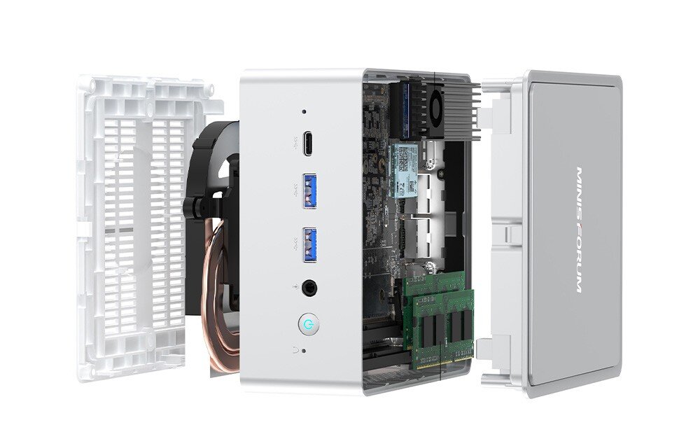 Komputer MINISFORUM NAB6 Lite Rozłożony komputer z widoczną płytą główną, pamięcią RAM i układem chłodzenia obok zdejmowanej pokrywy