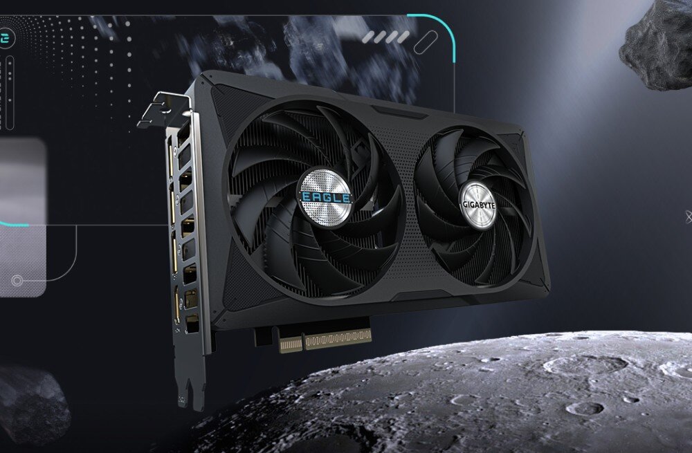 Komputer MAD DOG GENESIS-A02WB16WP Karta graficzna z dwoma dużymi wentylatorami i oznaczeniem modelu. W tle fioletowo-szara grafika z logo producenta, karta graficzna, architektura, wentylatory