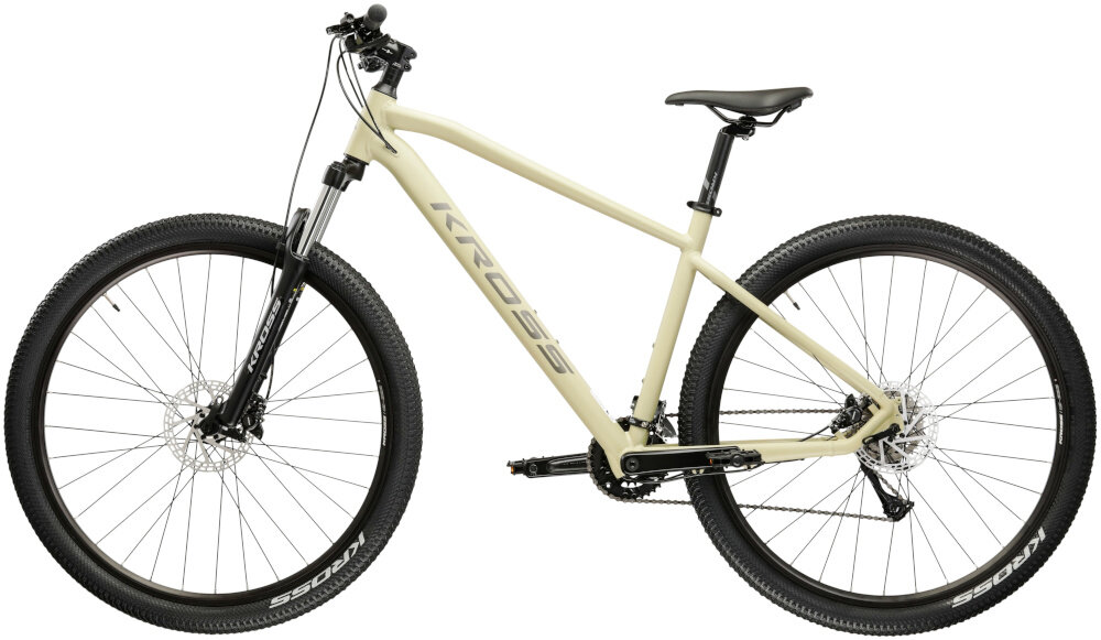 Rower górski MTB KROSS XPRT 9.1 M18 29 cali męski Beżowo-ciemnoszary rower na białym tle widoczny z boku góral pojazd dla sportowców do jazdy wyczynowej uniwersalny dla amatorów zwrotny łatwo wchodzi w zakręty do jazdy w mieście za miastem w lesie na górskim szlaku w błocie nie za głębokim piachu
