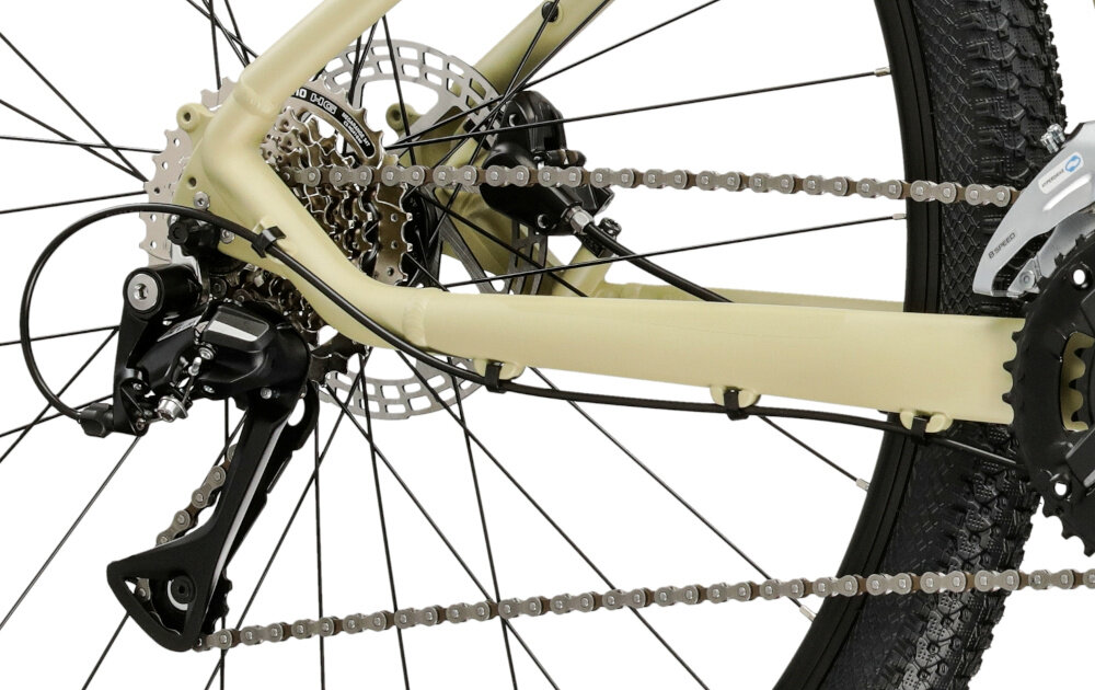 Rower górski MTB KROSS XPRT 9.1 M20 29 cali męski Beżowo-ciemnoszary zbliżenie na tylną przerzutkę przerzutki marki SHIMANO 16 przełożeń duża wytrzymałość i sprawne działanie zmiana biegów jest płynna i bezproblemowa przednia przerzutka SHIMANO Altus technologia SHADOW przerzutka jest schowana i mniej narażona na uszkodzenia tylna SHIMANO Acera precyzyjna praca mechanizmu komfort i kontrola