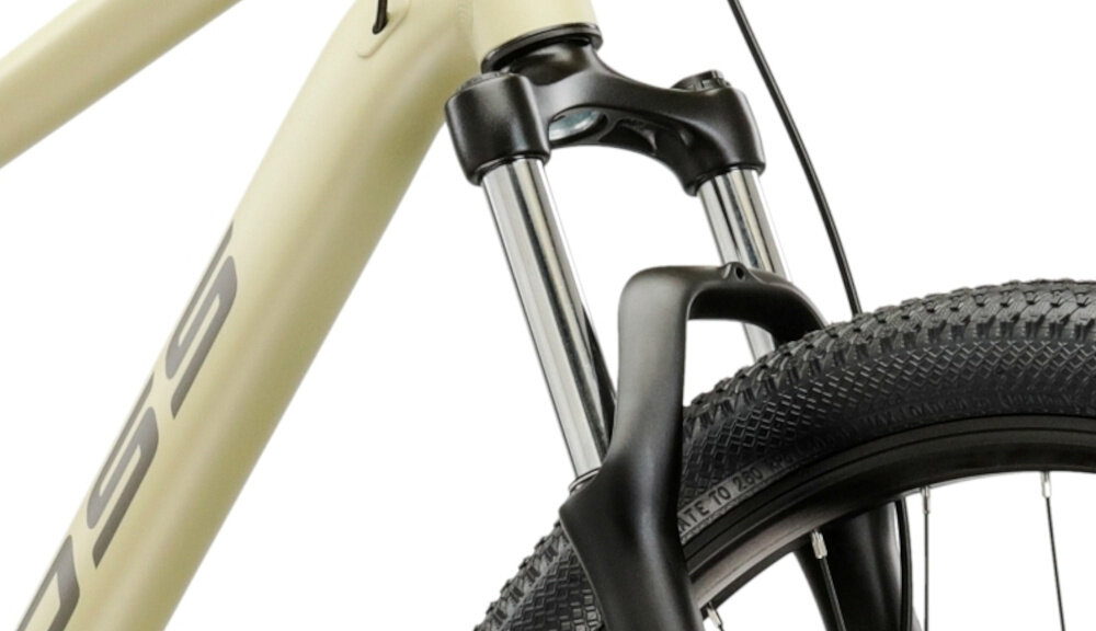 Rower górski MTB KROSS XPRT 9.1 M20 29 cali męski Beżowo-ciemnoszary zbliżenie na amortyzator widok lekko pod skosem rower typu hardtail przedni amortyzator ZOOM typu Fargo 565D ze skokiem 100 mm ułatwia najeżdżanie na przeszkody niweluje wstrząsy niska masa roweru duża sztywność regulacja za pomocą sprężyny obsługa poprzez manetkę