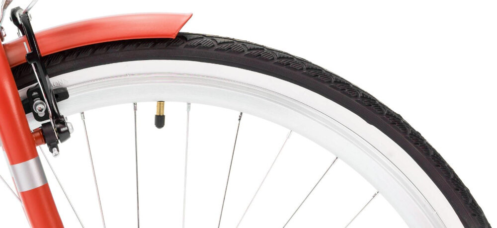 Rower miejski INDIANA Moena S7B 28 cali damski Perłowy róż zbliżenie na oponę rozmiar koła 28 cali łatwo pokonać różne przeszkody wąskie opony renomowanej marki WANDA stożkowe obręcze zachowanie regularnego kształtu kół stabilne trzymanie opony regularne sprawdzanie ciśnienia powietrza wartość na bocznej części opony