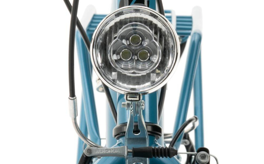 Rower miejski INDIANA Moena S7B 28 cali damski Niebieski zbliżenie na przednią lampę bezpieczeństwo przednie i tylne oświetlenie LED dobra widoczność bezpieczeństwo na drodze zasilane przez baterie odblaski dobrze widoczny na drodze bezpieczny wymagane przez prawo drogowe