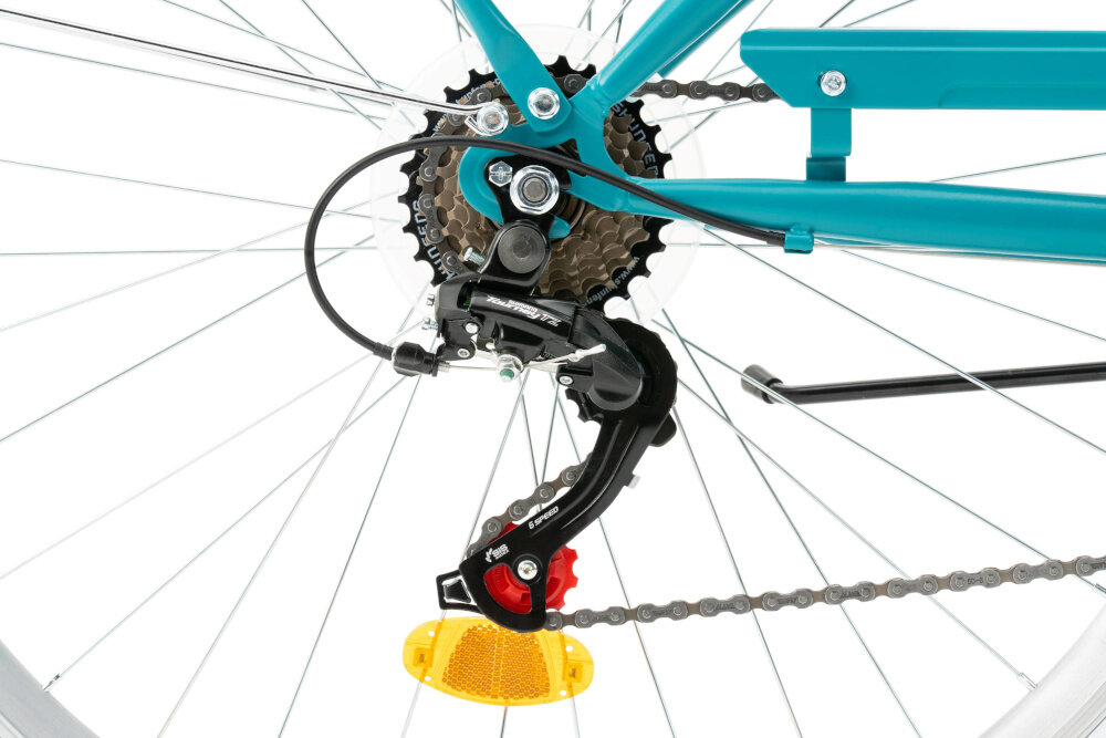 Rower miejski INDIANA Moena S7B 28 cali damski Morski zbliżenie na przerzutkę 7 przełożeń tylne przerzutki SHIMANO Tourney duża wytrzymałość i sprawne działanie zmiana biegów jest płynna i bezproblemowa obrotowa manetka SHIMANO RevoShift dobranie właściwego przełożenia do danego terenu