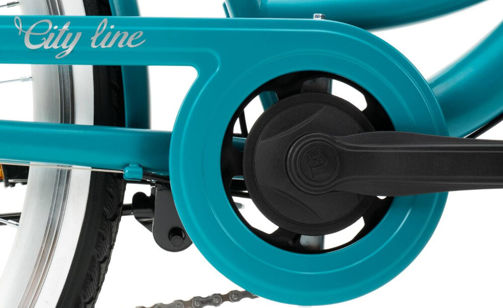 Rower miejski INDIANA Moena S7B 28 cali damski Morski zbliżenie na korbę widoczną z boku stalowa i wydajna konstrukcja korby marki JIWAN 38T wolnobieg marki JIWAN 38T wytrzyma obciążenie nawet w trudnych warunkach wytrzyma bardzo duży nacisk na pedały