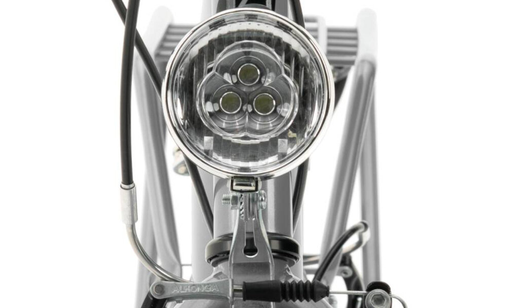 Rower miejski INDIANA Moena S7B 28 cali damski Srebrny zbliżenie na przednią lampę bezpieczeństwo przednie i tylne oświetlenie LED dobra widoczność bezpieczeństwo na drodze zasilane przez baterie odblaski dobrze widoczny na drodze bezpieczny wymagane przez prawo drogowe