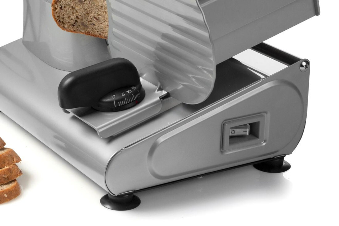 Krajalnica GORENJE R 506 E bezpieczeństwo użytkowanie korzystanie konstrukcja gumowe nóżki praca wyłącznik krojenie komfott użytkowanie bezpieczeństwo