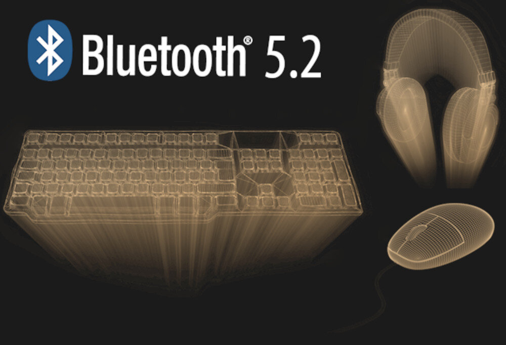 Obraz przedstawia przezroczyste modele klawiatury, słuchawek i myszy na ciemnym tle. Widoczny jest tekst \'Bluetooth 5.2\'.