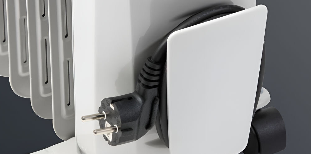 Grzejnik olejowy ROWENTA BU2620F0 bezpieczny wygodny w użytkowaniu zabezpieczenia auto-off automatyczne wyłączenie przewrócenie przegrzanie długi kabel schowek na kabel bez plątania