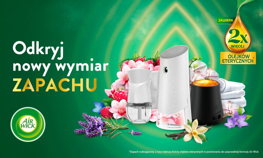 Na zielonym tle widoczne są różne odświeżacze powietrza otoczone kwiatami. Tekst na obrazie: \'Odkryj nowy wymiar ZAPACHU\', \'Zawiera 2x więcej olejków eterycznych\', \'Air Wick\'.