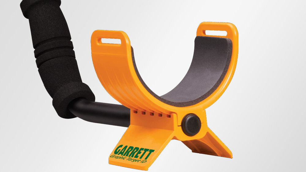 Wykrywacz metalu GARRETT ACE 150, baterie AA, słuchawkowe, 1/4cala, alert, Pomarańczowy podłokietnik wykrywacza metali Garrett ACE 150.