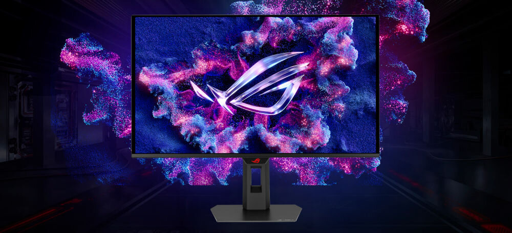 Monitor ASUS ROG Strix XG27ACDMS 26.5 cali 2560x1440px 280Hz 0.03 ms [GTG] Monitor na biurku z dynamicznym logo w ciemnej scenerii z fioletowym podświetleniem, odświeżanie, płynność, czas reakcji