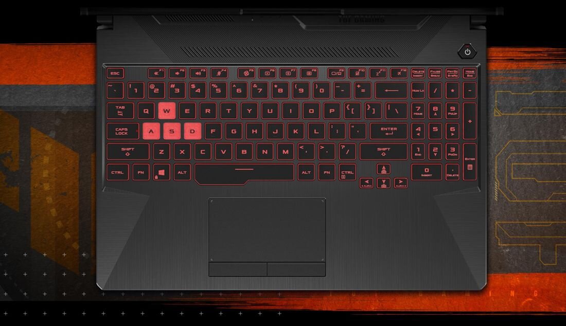Widok z góry na klawiaturę laptopa ASUS TUF Gaming A15 z czerwonym podświetleniem, wyróżnione klawisze WASD, pełny blok numeryczny i wyraźne oznaczenia przycisków funkcyjnych, gamingowe tło w odcieniach pomarańczu i grafitu. - Klawiatura TUF Gaming Jednolite podświetlenie RGB 