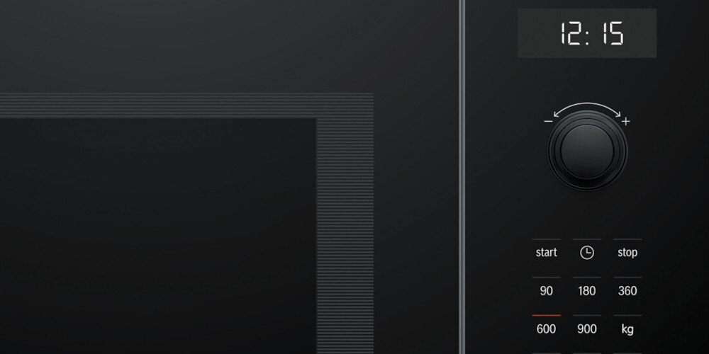 KUCHNIA MIKROFALOWA BOSCH BEL554MB0 zbliżenie panel pokrętło Wyświetlacz godzina czas chowane pokrętła gładka powierzchnia panel sterujący łatwe czyszczenie brak zabrudzeń szybkie utrzymanie czystości wygoda użytkowania