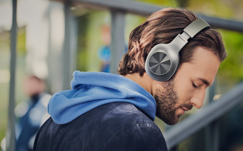 Słuchawki nauszne PANASONIC RB-HX220 wygoda bezprzewodowe uniwersalność zasięg dźwięk mocny bas brzmienie ergonomia konstrukcja akumulator