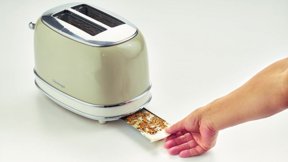 Toster ARIETE 155/03 Vintage toster wyjmowana tacka ze spodu tostera zebrane okruchy wbudowana tacka na okruchy specjalny pojemnik zbieranie okruchów znajduje się na spodzie tostera łatwe wysunięcie i wyczyszczenie moc 810 W efektywne działanie automatyczny wyłącznik przemyślana konstrukcja starannie dobrane funkcje dobre estetycznie podane śniadania 