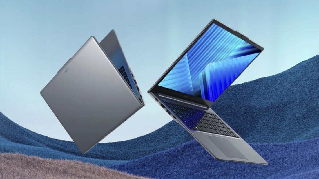 Laptop Acer Extensa 15 prezentuje smukłą obudowę i ekran z abstrakcyjną grafiką na minimalistycznym tle podczas pracy biurowej