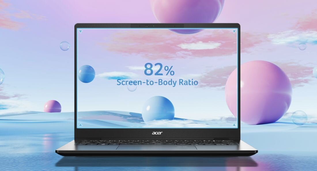 Laptop z logo \'acer\' na dolnej ramce ekranu, wyświetlający tekst \'82% Screen-to-Body Ratio\' na tle nieba z różowymi i niebieskimi kulami.