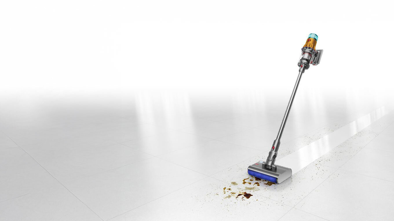 Zdjęcie odkurzacza Dyson V12s Detect Slim Submarine zmywającego brudną podłogę.