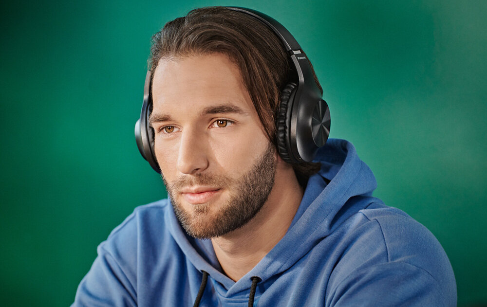 Słuchawki nauszne PANASONIC RB-HX220 wygoda bezprzewodowe uniwersalność zasięg dźwięk mocny bas brzmienie ergonomia konstrukcja akumulator