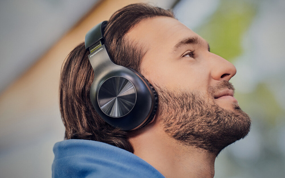 Słuchawki nauszne PANASONIC RB-HX220 wygoda bezprzewodowe uniwersalność zasięg dźwięk mocny bas brzmienie ergonomia konstrukcja akumulator