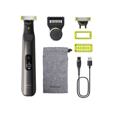 Na obrazie znajduje się trymer z kilkoma akcesoriami, w tym nasadkami, etui, kablem USB i szczoteczką. Widoczne jest logo \'PHILIPS\' na etui.
