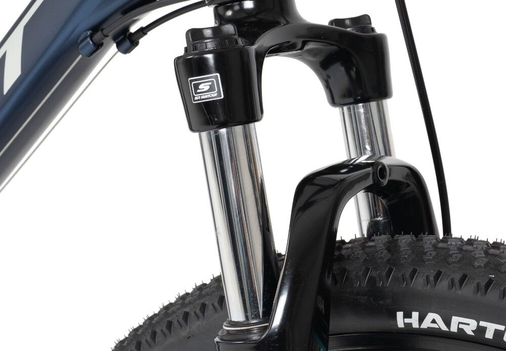 Rower górski MTB ROMET Rambler R7.1 E U19 27.5 cala Granatowy zbliżenie na amortyzator rower typu hardtail przedni amortyzator SUNTOUR typu XCE ze skokiem 100 mm ułatwia najeżdżanie na przeszkody niweluje wstrząsy niska masa roweru duża sztywność regulacja za pomocą sprężyny obsługa poprzez manetkę