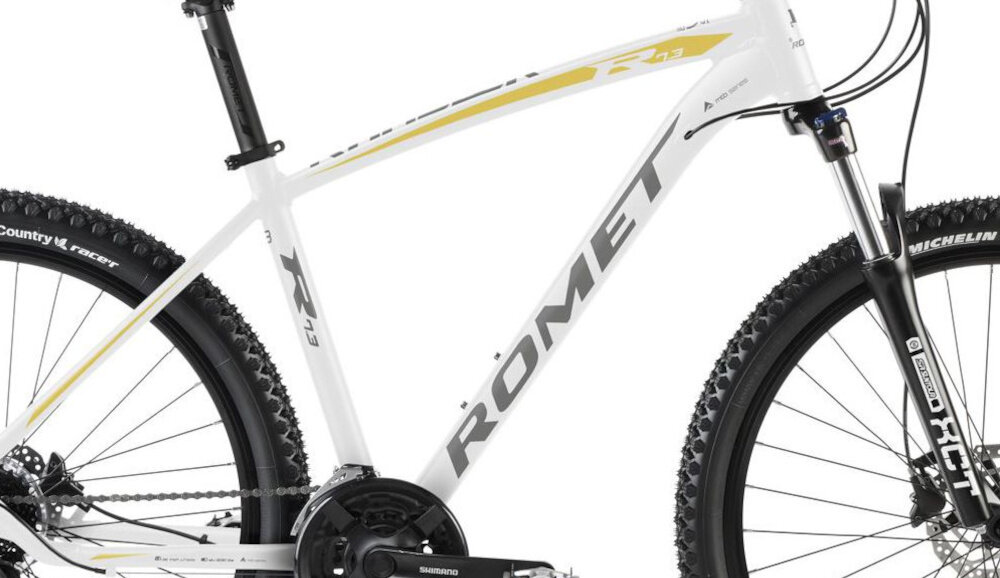 Rower górski MTB ROMET Rambler R7.3 U20 27.5 cala Biało-złoty zbliżenie na ramę białe tło 20-calowa aluminiowa ramę rower zwinny lekki łatwo go podnieść odporność na korozję wybór rozmiaru ramy Twój wzrost mierzony w zrelaksowanej pozycji typ roweru dla osób o wzroście od 178 do 188 cm