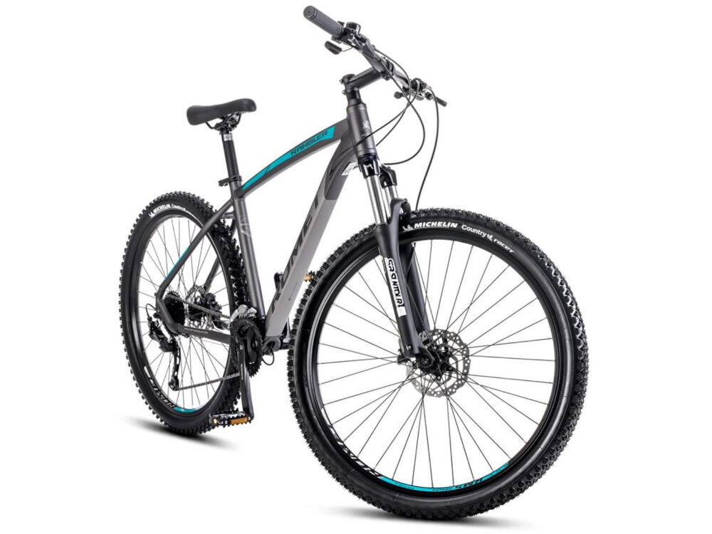 Rower górski MTB ROMET Rambler R7.4 C U18 27.5 cala Grafitowo-srebrno-turkusowy rower na białym tle widoczny od przodu pod skosem środek codziennego transportu relaks pasja uniwersalność