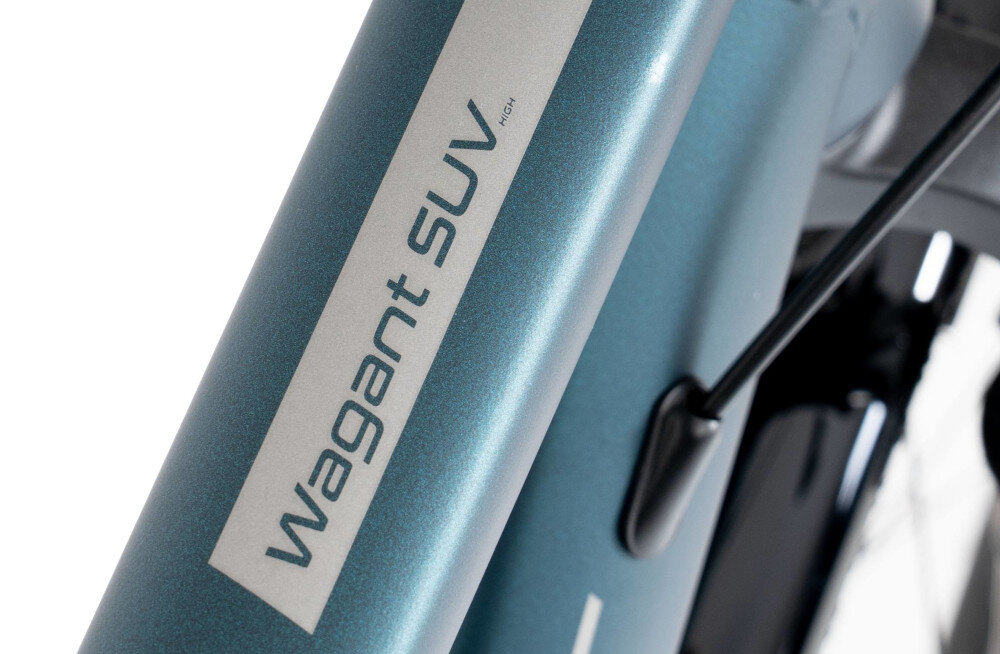 Rower trekkingowy ROMET Wagant SUV H PV B U18 28 cali Zielony zbliżenie na ramę widok z góry 18-calowa aluminiowa rama rower jest bardzo zwinny lekki (waga 16 kg) łatwo podnieść go odporny na korozję wybór rozmiaru ramy Twój wzrost mierzony w zrelaksowanej pozycji typ roweru dla osób o wzroście od 171 do 176 cm