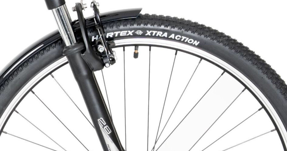 Rower trekkingowy ROMET Wagant SUV H PV B U18 28 cali Zielony zbliżenie na przednie koło rozmiar koła 28 cali łatwo jest pokonać różne przeszkody duży kontakt koła z podłożem szerokie opony marki HARTEX aluminiowe obręcze stabilne trzymanie opony regularne sprawdzanie ciśnienia powietrza wartość na bocznej części opony