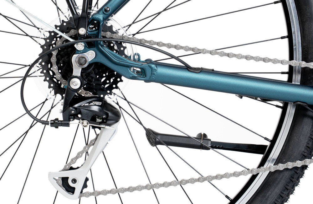 Rower trekkingowy ROMET Wagant SUV H PV B U18 28 cali Zielony zbliżenie na tylną przerzutkę przerzutki marki SHIMANO 24 przełożeń duża wytrzymałość i sprawne działanie przednia przerzutka SHIMANO Tourney Tylne przerzutki SHIMANO Alivio ciche działanie