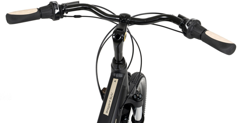 Czarny rower trekkingowy z widocznym kierownicą i napisem \'Wagant SUV\' na ramie.