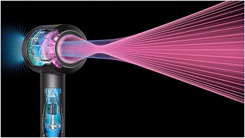 Zbliżenie na suszarkę, która emituje strumień powietrza w różowym kolorze.