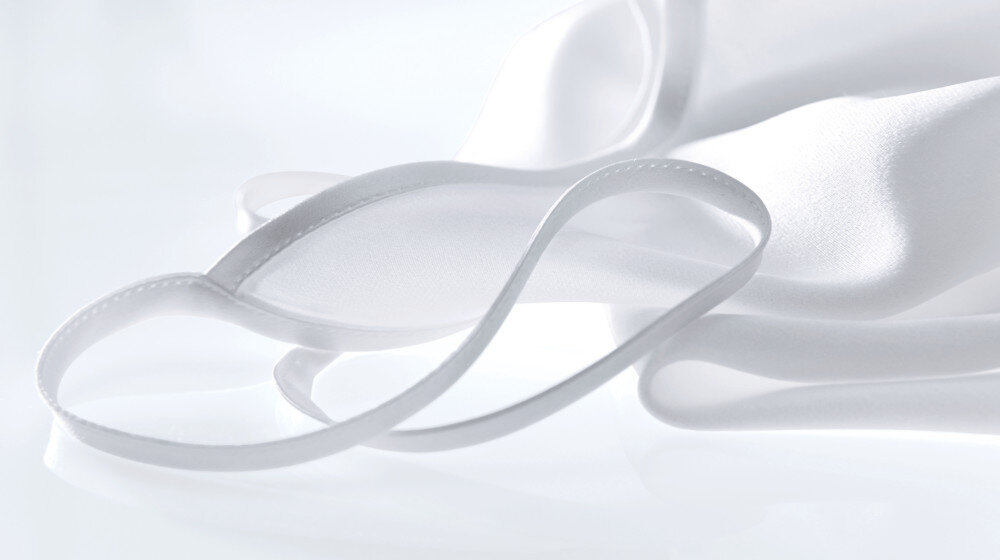 SUSZARKA MIELE TQ 1000 WP NOVA EDITION zdjęcie lifestyle biała deliatna tkanina materiał biel lekkość delikatne wrażliwe Jedwab delikatne tkaniny bezpieczne pranie bez uszkodzeń