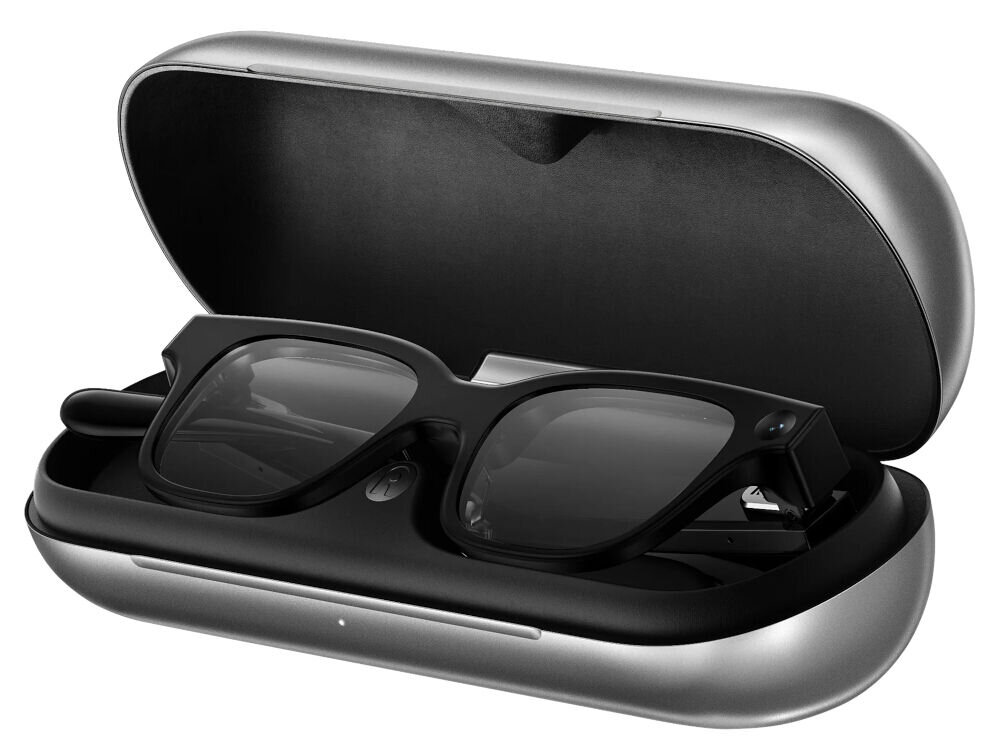 Okulary AI lekka konstrukcja bateria etui Czarne okulary inteligentne Rokid umieszczone w otwartym, srebrnym etui ładującym o ergonomicznym kształcie
