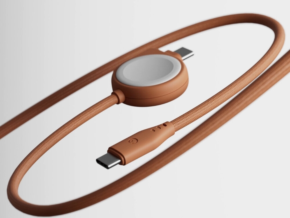 Pomarańczowy kabel USB-C - USB-C z okrągłym elementem przypominającym ładowarkę MagSafe. Kabel ma plecioną strukturę i widoczne są dwa złącza USB-C.