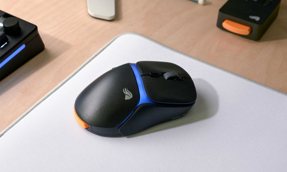 Glorious Gaming Model D3 przełączniki optyczne 130 milionów kliknięć Technologia optyczna zmniejsza ryzyko wystąpienia podwójnych kliknięć -  mysz leżącą na biurku