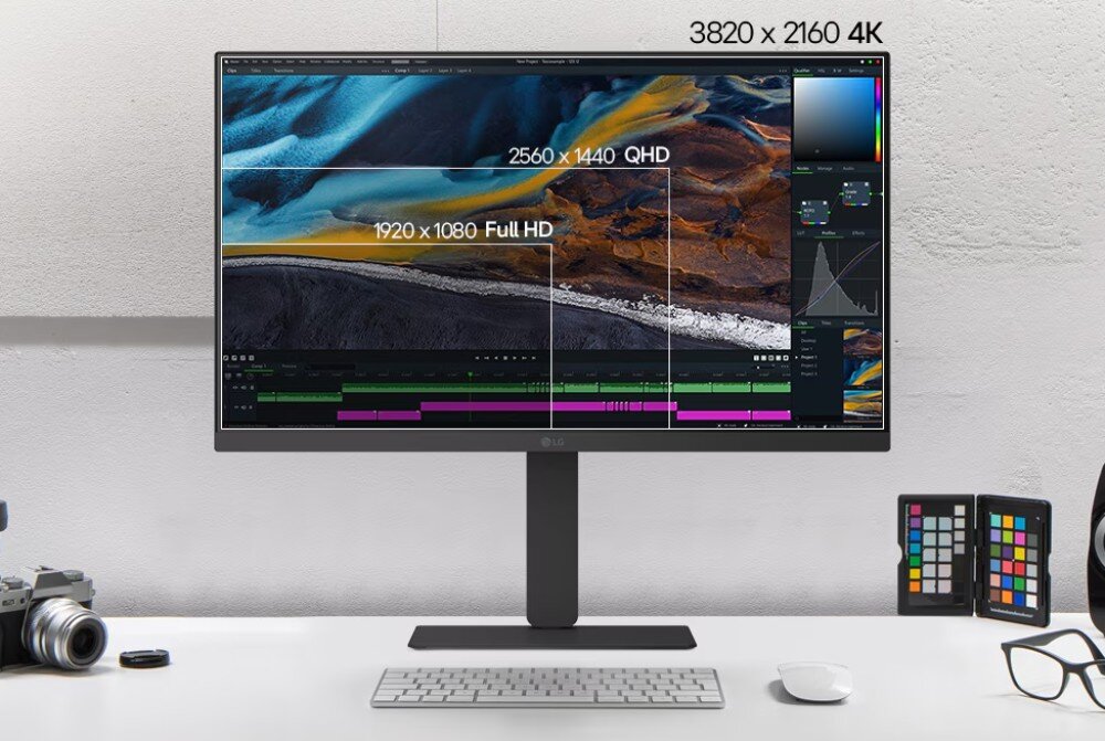 Monitor LG UltraFine 27U730A-B frontowa strona monitora z grafiką krajobrazu i nałożonymi ramkami obrazującymi różnice w rozdzielczościach między Full HD, QHD a 4K