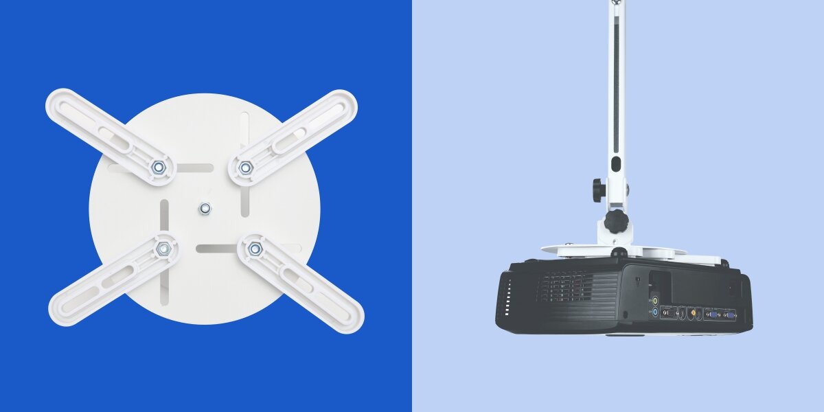 Uchwyt sufitowo-ścienny HAMA 220880 Maksymalne obciążenie 15 kg Biały Widok od dołu na płytę montażową z czterema regulowanymi ramionami oraz projektor podwieszony na białym statywie.