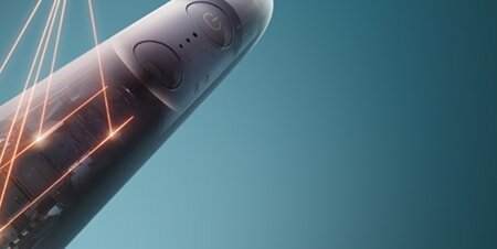 Zbliżenie na wnętrze szczoteczki, z którego roztaczają się laserowe połączenia.