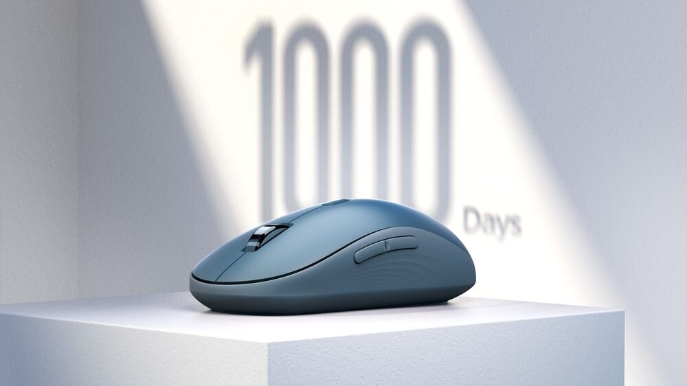 LENOVO Yoga bez konieczności częstej wymiany baterii Żywotność baterii do 36 miesięcy - mysz na boksie, w tle napis 1000 days