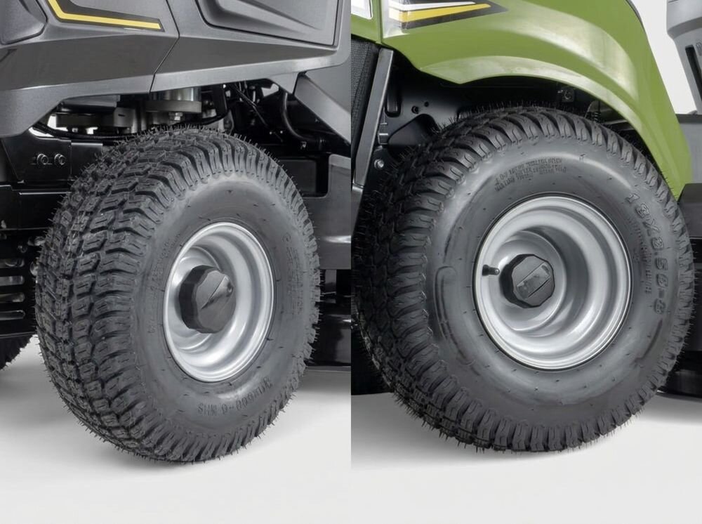 Traktor ogrodowy HORX MEX TS 186 M D452 860mm 9.2kW, teren, koła, przyczepność, bezpieczeństwo, Zbliżenie na czarny agregat tnący traktorka kosiarki z kółkiem wsporczym i naklejkami ostrzegawczymi.