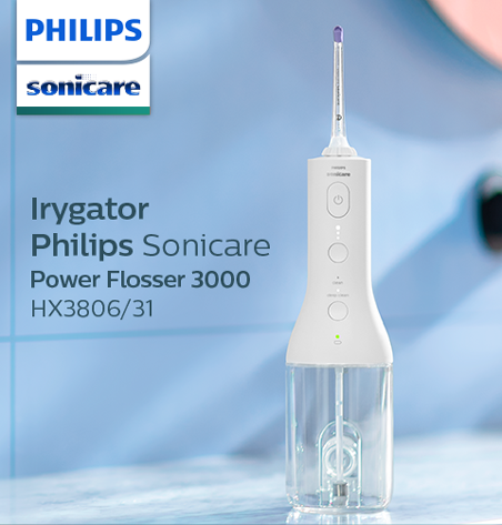 Na obrazie widoczny jest biały irygator marki Philips Sonicare z przezroczystym zbiornikiem na wodę. Obok urządzenia znajduje się tekst: \'Irygator Philips Sonicare Power Flosser 3000 HX3806/31\'.