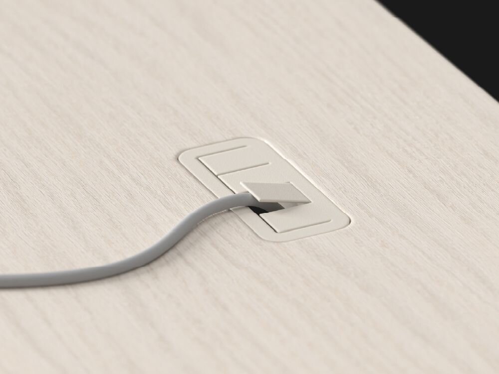 Biurko ENDORFY Atlas S Electric Jasne Drewno Przepust kablowy w blacie biurka Endorfy Atlas S Electric utrzymanie porządku