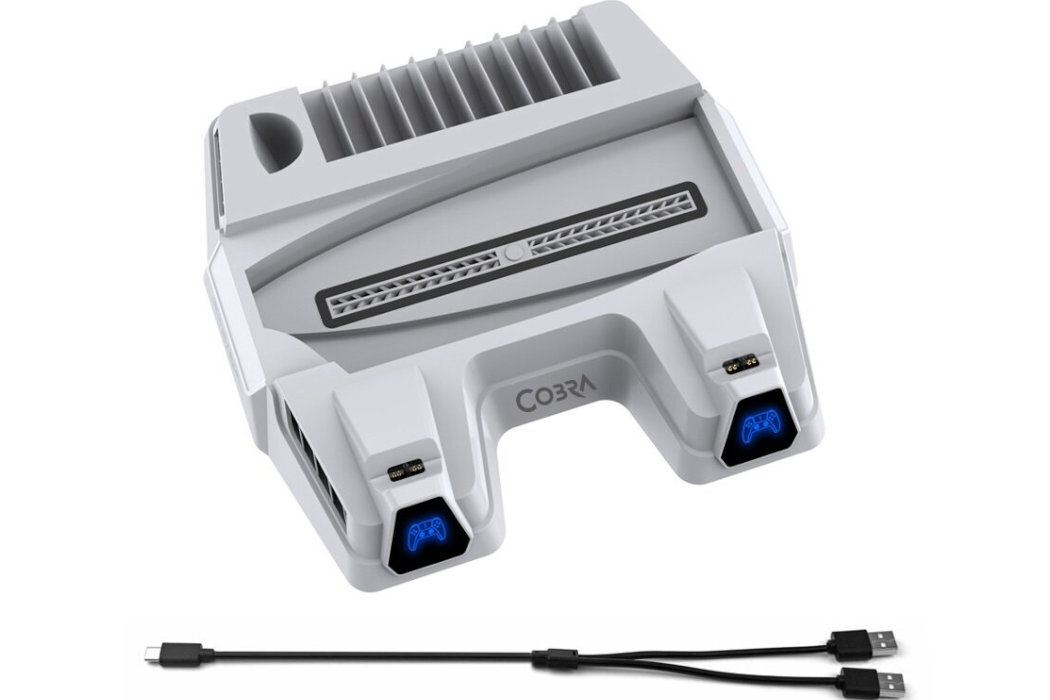 Na obrazie widoczna jest biała podstawka chłodząca z napisem \'COBRA\' oraz dwoma portami USB. Obok znajduje się czarny kabel USB z dwoma wtyczkami.