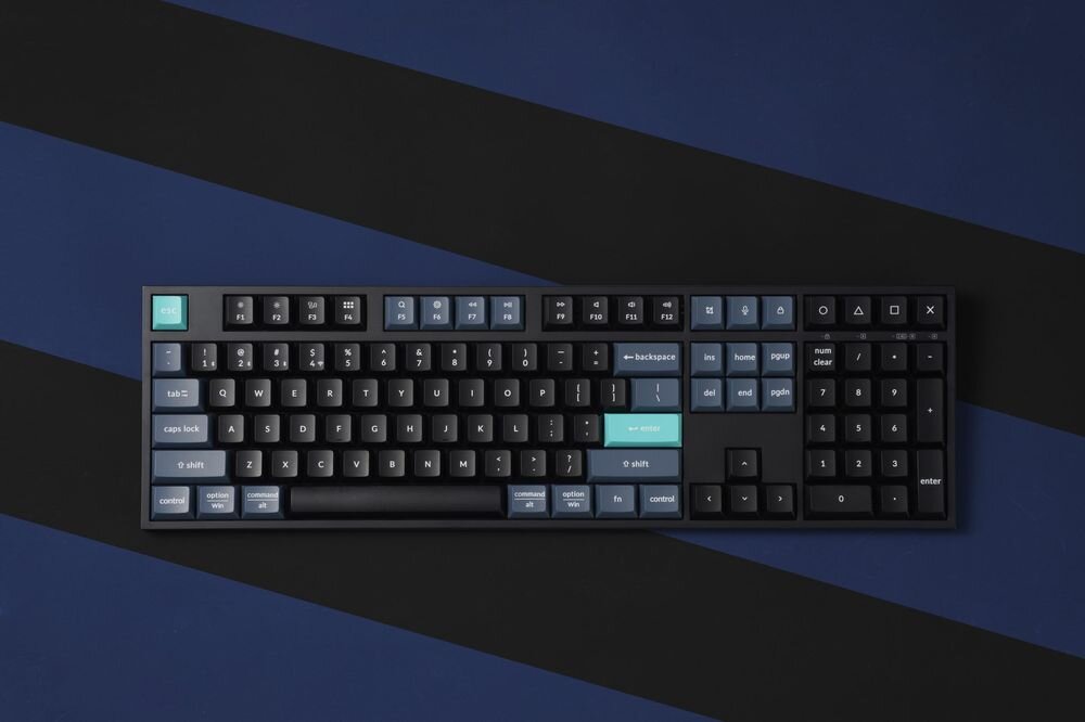 KEYCHRON B36 KEYCHRON B36 437 x 131 x 26 mm 650 g Lekka konstrukcja stabilna rama - klawiatura od góry na czarno-niebieskim tle