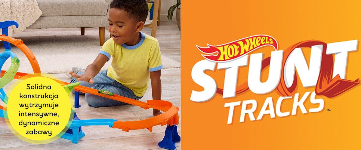 Dziecko bawi się kolorowym torem wyścigowym z pętlami. Obok widoczny jest napis: \'Solidna konstrukcja wytrzymuje intensywne, dynamiczne zabawy\' oraz logo \'Hot Wheels Stunt Tracks\'.